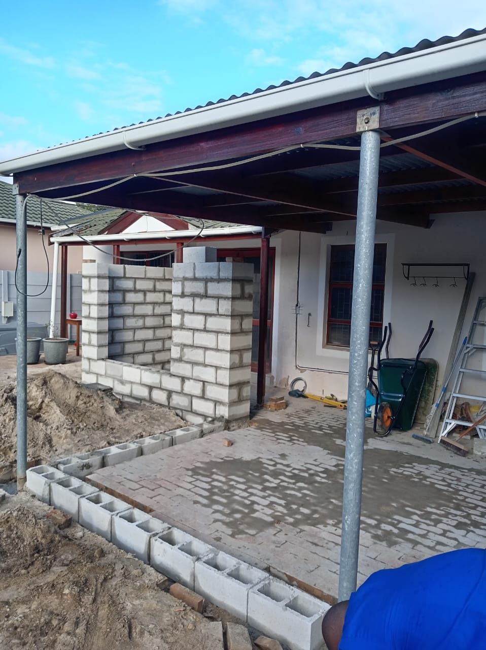 Carport and boundary wall under construction